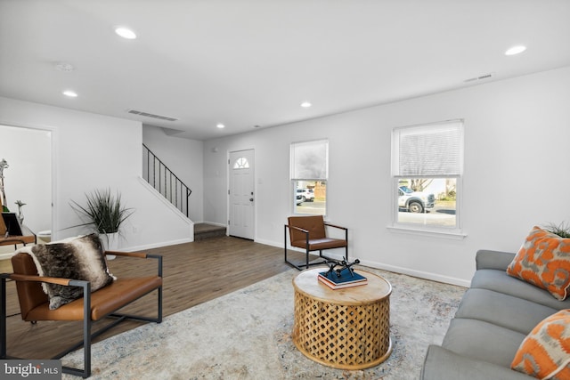 living room with dark wood-type flooring