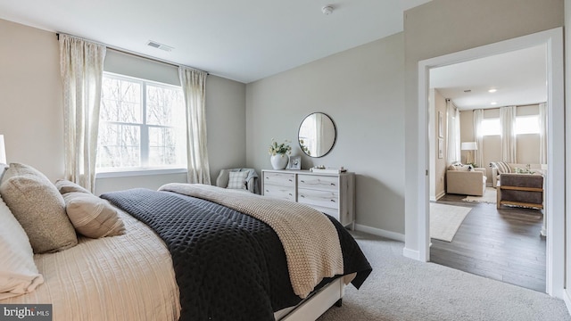 bedroom featuring wood-type flooring