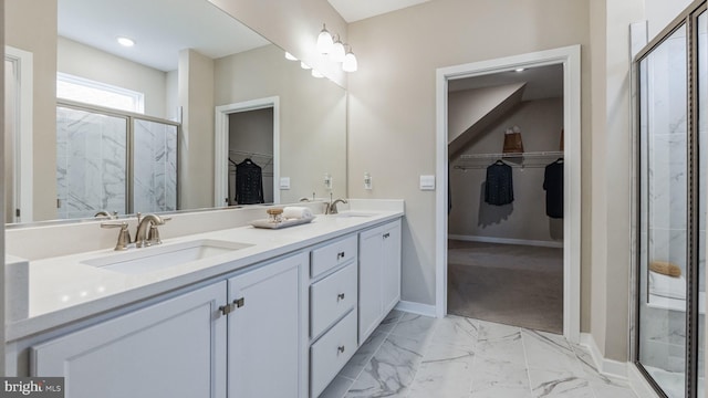 bathroom featuring vanity and walk in shower