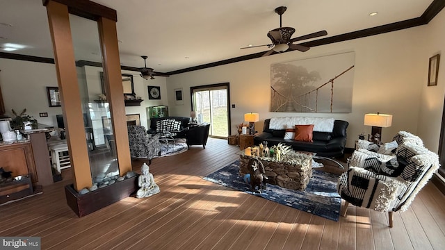 living room featuring hardwood / wood-style flooring, ceiling fan, and ornamental molding