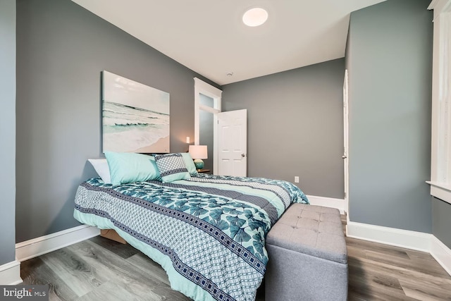 bedroom featuring hardwood / wood-style flooring