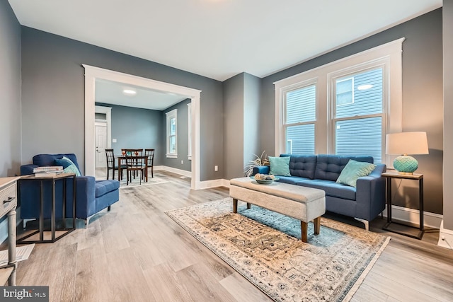 living room with light hardwood / wood-style floors