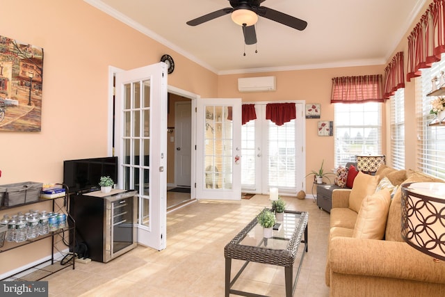 tiled living room featuring a wall mounted air conditioner, ceiling fan, ornamental molding, and french doors