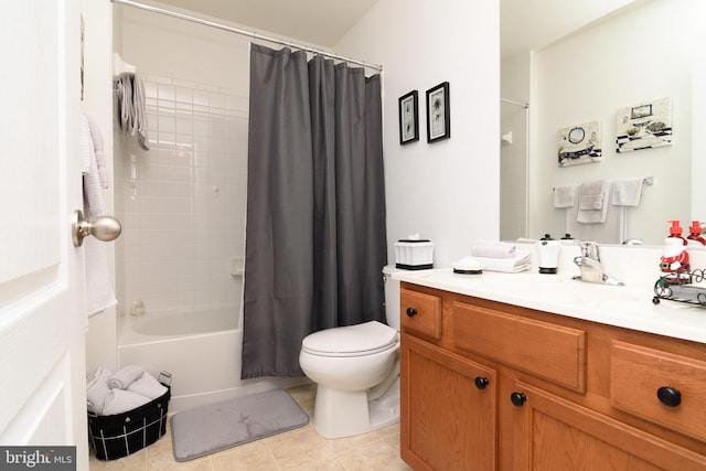 full bathroom featuring tile patterned floors, shower / tub combo with curtain, vanity, and toilet