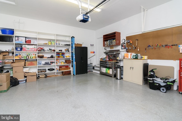 garage featuring a garage door opener