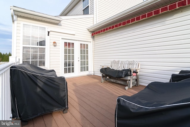 deck with grilling area and french doors