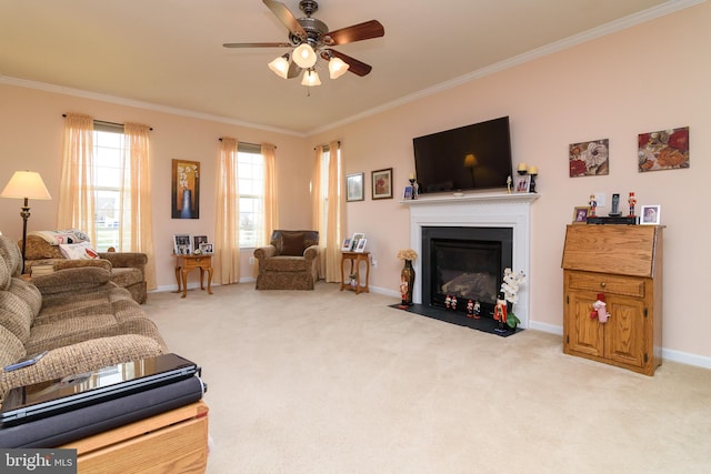 living room featuring crown molding, ceiling fan, and light colored carpet