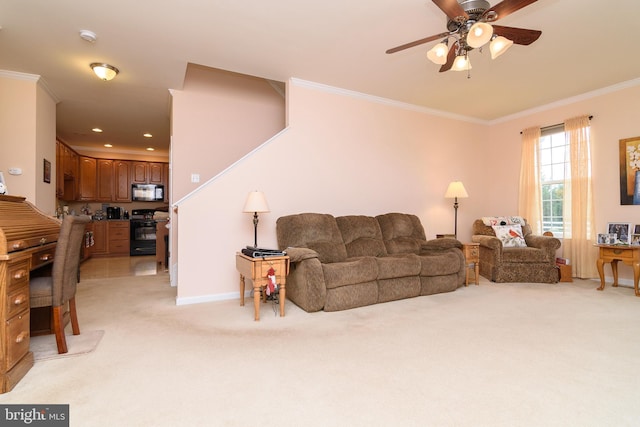 carpeted living room featuring ceiling fan and crown molding