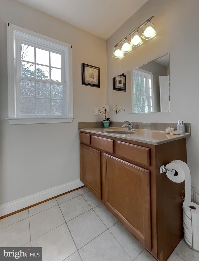 bathroom with vanity and tile patterned floors