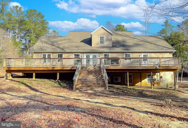 rear view of house featuring a deck