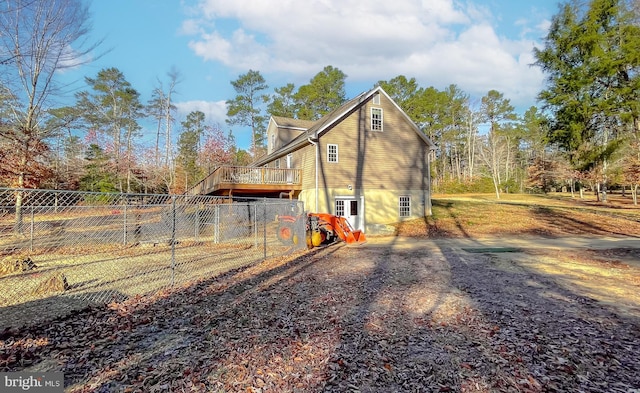 exterior space featuring a wooden deck