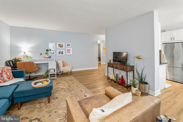 living room featuring light wood-type flooring