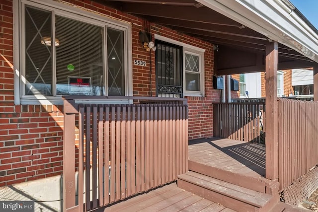 wooden deck with covered porch