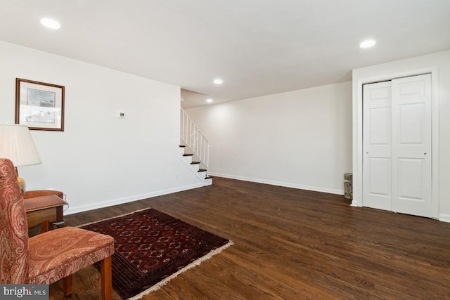 living area featuring dark hardwood / wood-style flooring