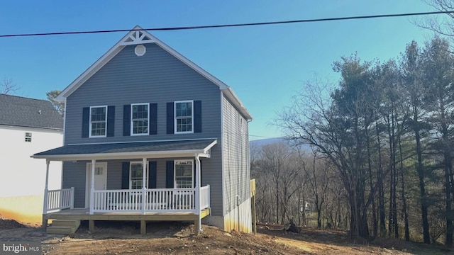 view of property with a porch