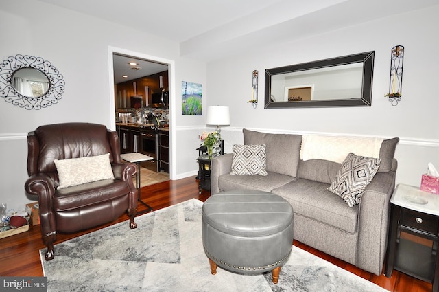 living room featuring dark hardwood / wood-style flooring