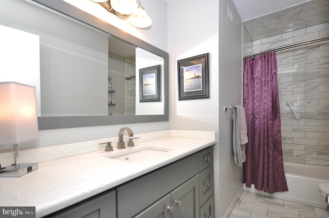 bathroom with vanity and shower / tub combo with curtain