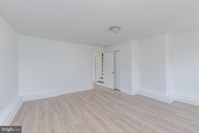 empty room featuring light hardwood / wood-style floors