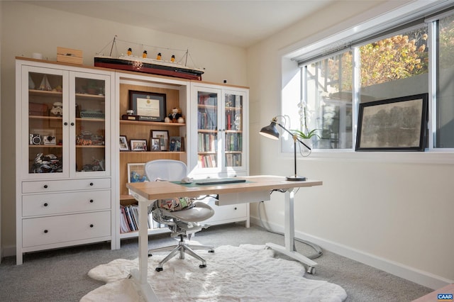 view of carpeted home office