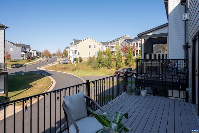 deck with a sunroom