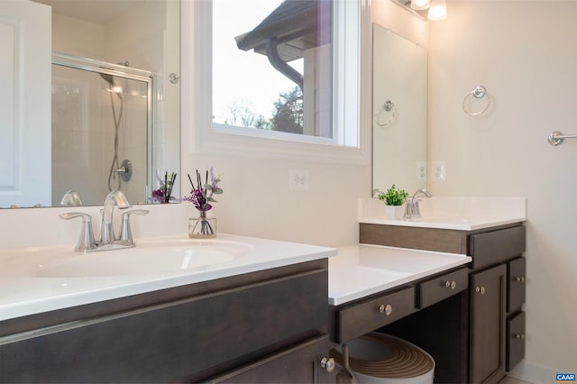 bathroom featuring vanity and walk in shower