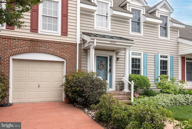 view of front of house with a garage