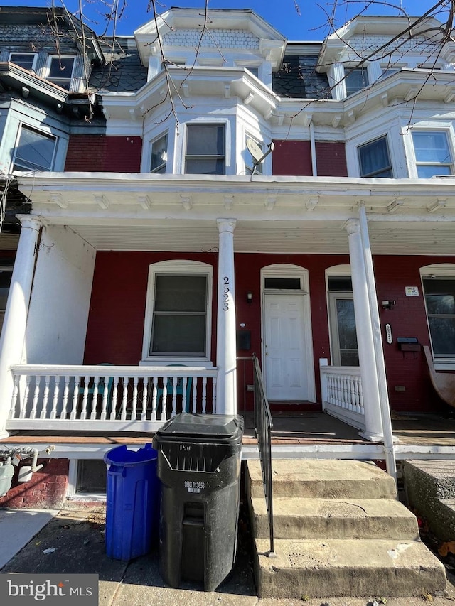 doorway to property featuring a porch