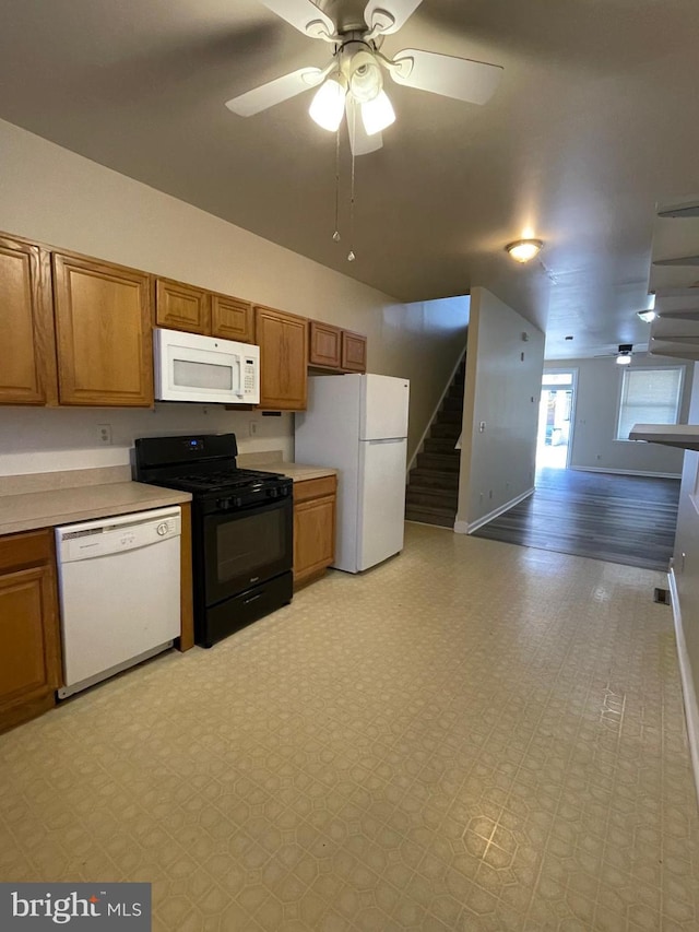 kitchen with ceiling fan, white appliances, and light wood-type flooring