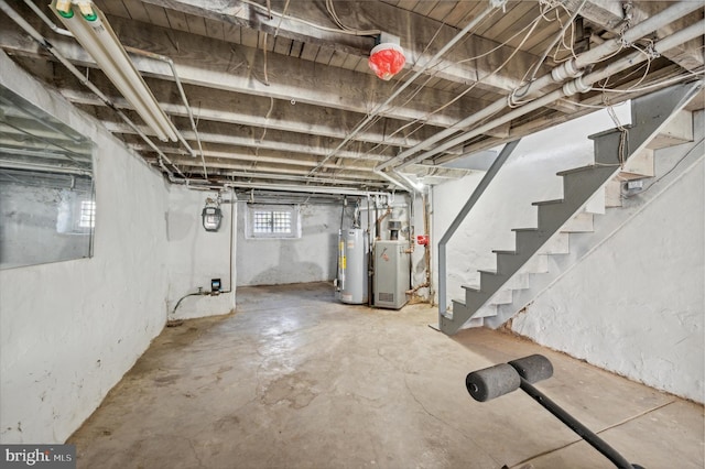 basement featuring gas water heater