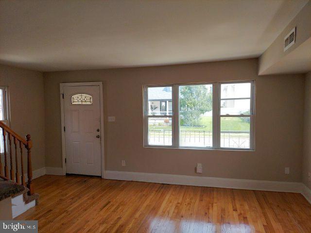 foyer entrance featuring light hardwood / wood-style flooring