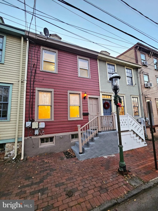 view of property featuring cooling unit