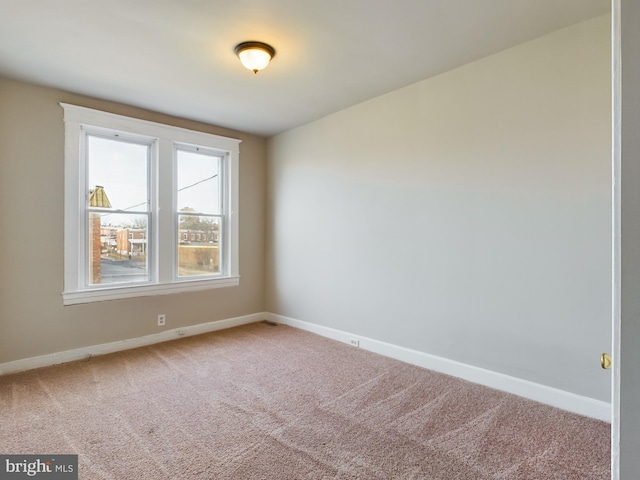 view of carpeted spare room