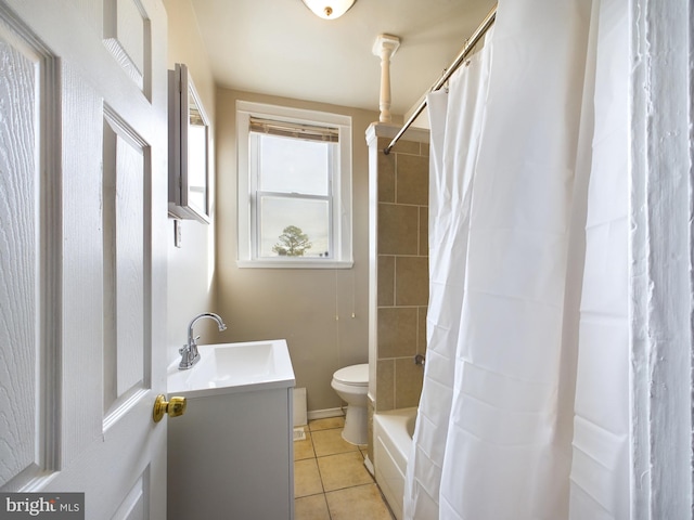 full bathroom featuring tile patterned floors, vanity, toilet, and shower / bath combo