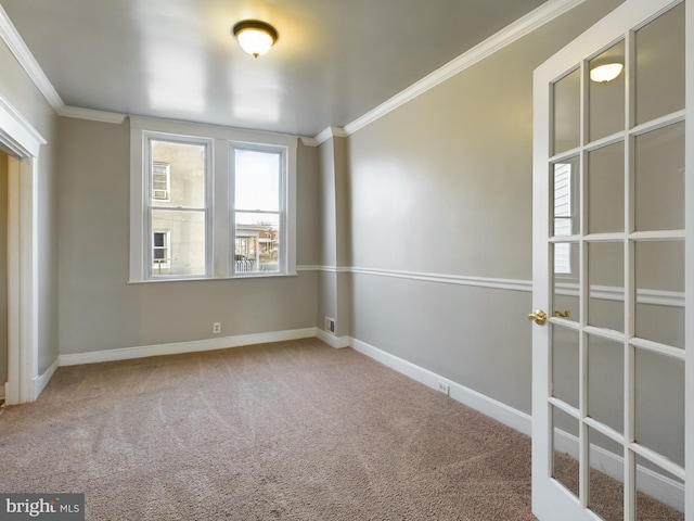 unfurnished room with carpet flooring and ornamental molding