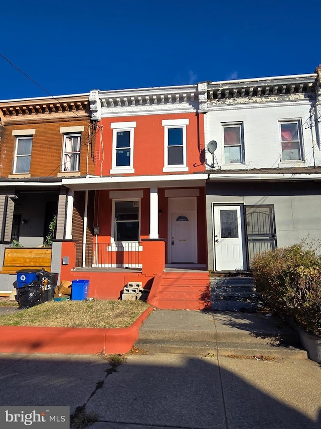 view of property with covered porch