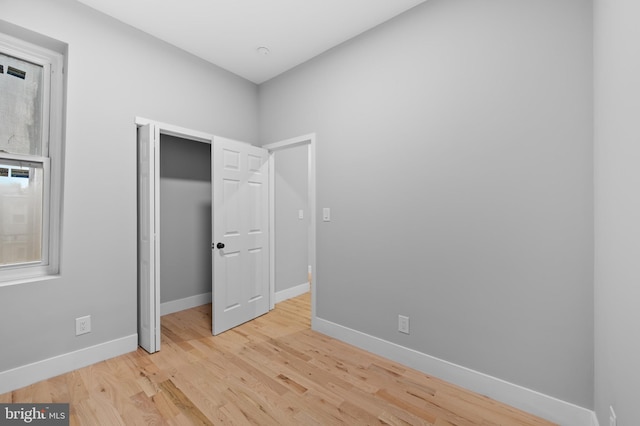 unfurnished bedroom featuring light hardwood / wood-style flooring