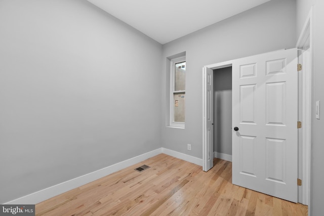 unfurnished bedroom with light hardwood / wood-style floors