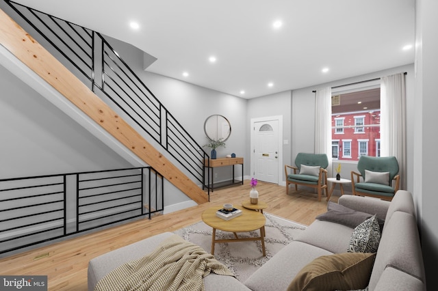 living room with light hardwood / wood-style flooring