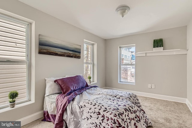 bedroom featuring carpet