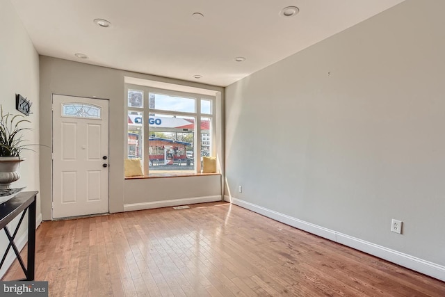 foyer entrance featuring hardwood / wood-style flooring