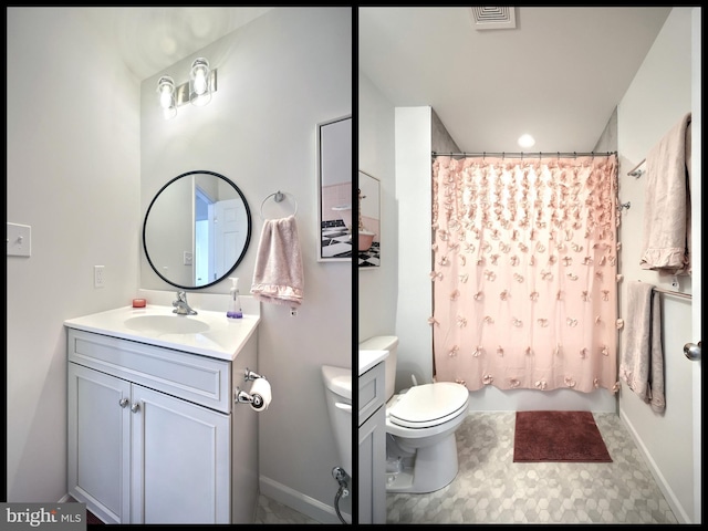 bathroom featuring vanity and toilet