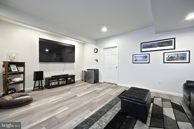 living room with light hardwood / wood-style floors