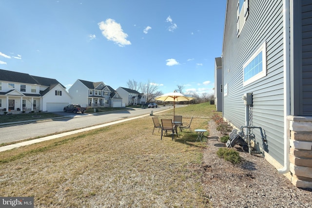 view of yard featuring a garage