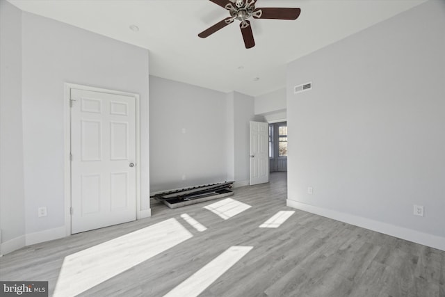 interior space featuring light hardwood / wood-style flooring and ceiling fan