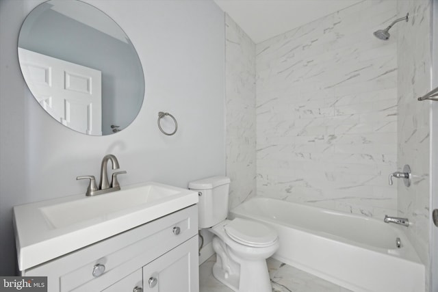 full bathroom with vanity, tiled shower / bath combo, and toilet