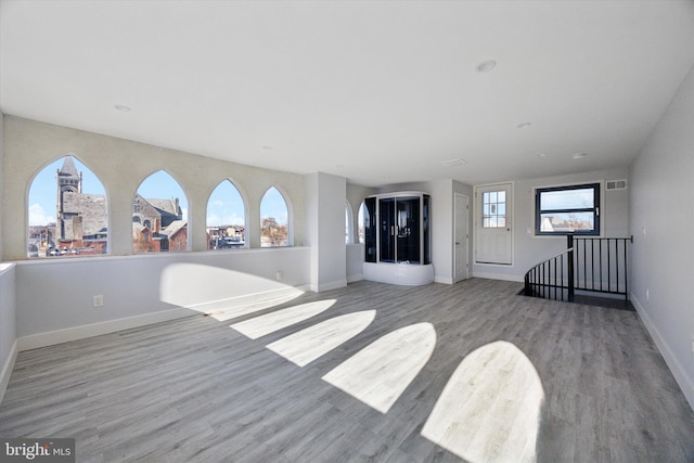 1939 W Diamond St, Philadelphia, PA 19121 - unfurnished living room featuring wood finished floors and baseboards