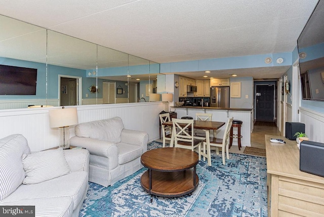 living room featuring a textured ceiling