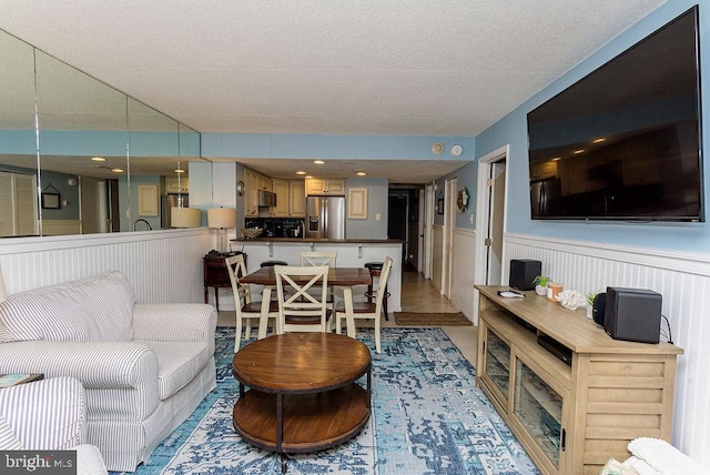 living room featuring a textured ceiling