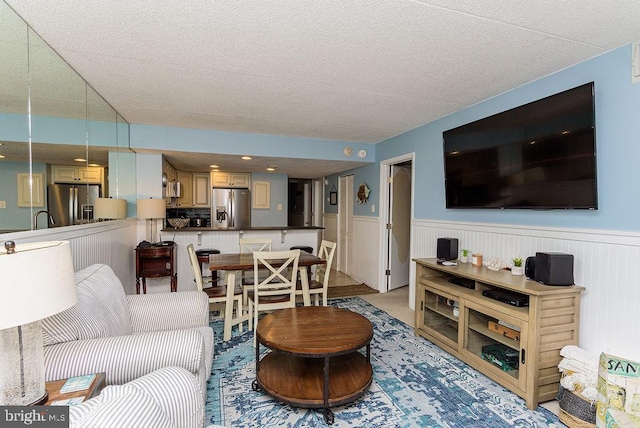 living room featuring a textured ceiling