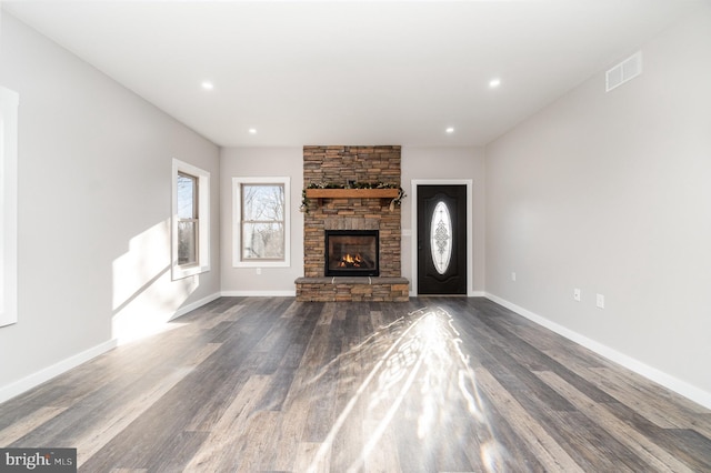 107 S Honeysuckle Dr, Hazle Township, PA 18202 - unfurnished living room with a fireplace, dark wood-type flooring, and recessed lighting
